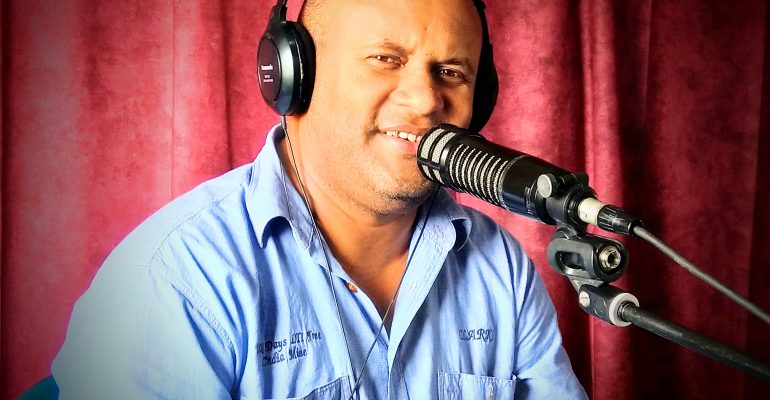 Willy Florian at microphone